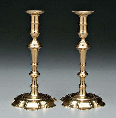 Appraisal: Pair petal base brass candlesticks baluster posts above petal bases