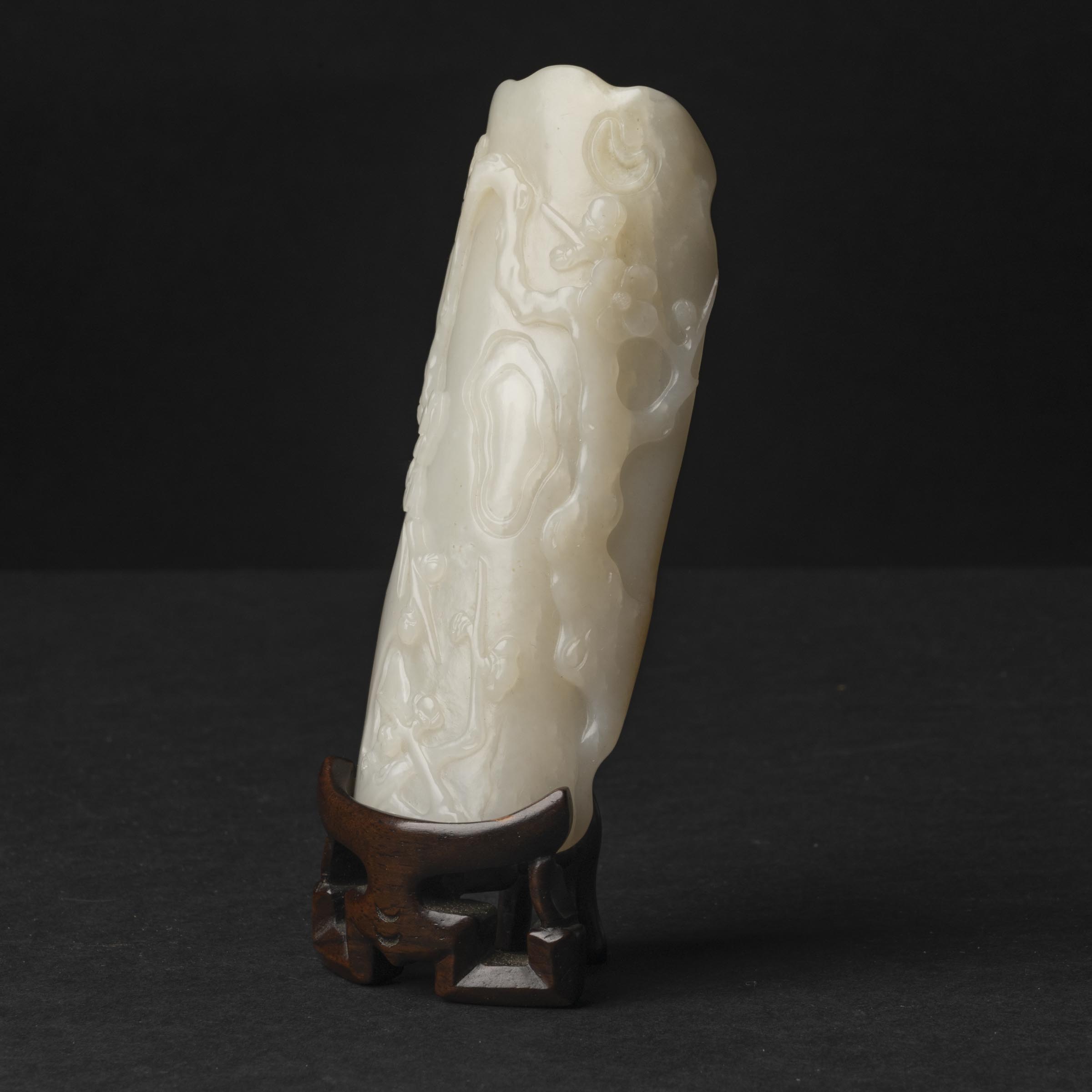 Appraisal: A White Jade 'Plum Blossom' Wrist Rest th Century Carved