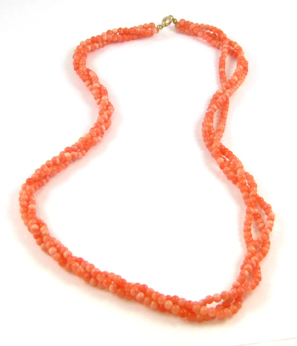 Appraisal: TRIPLE STRAND FAUX CORAL NECKLACE measuring inches in length and