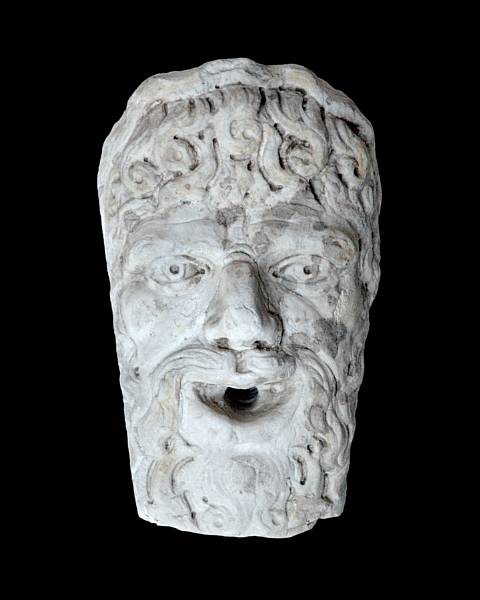 Appraisal: A Roman marble fountain mask st- th century AD The