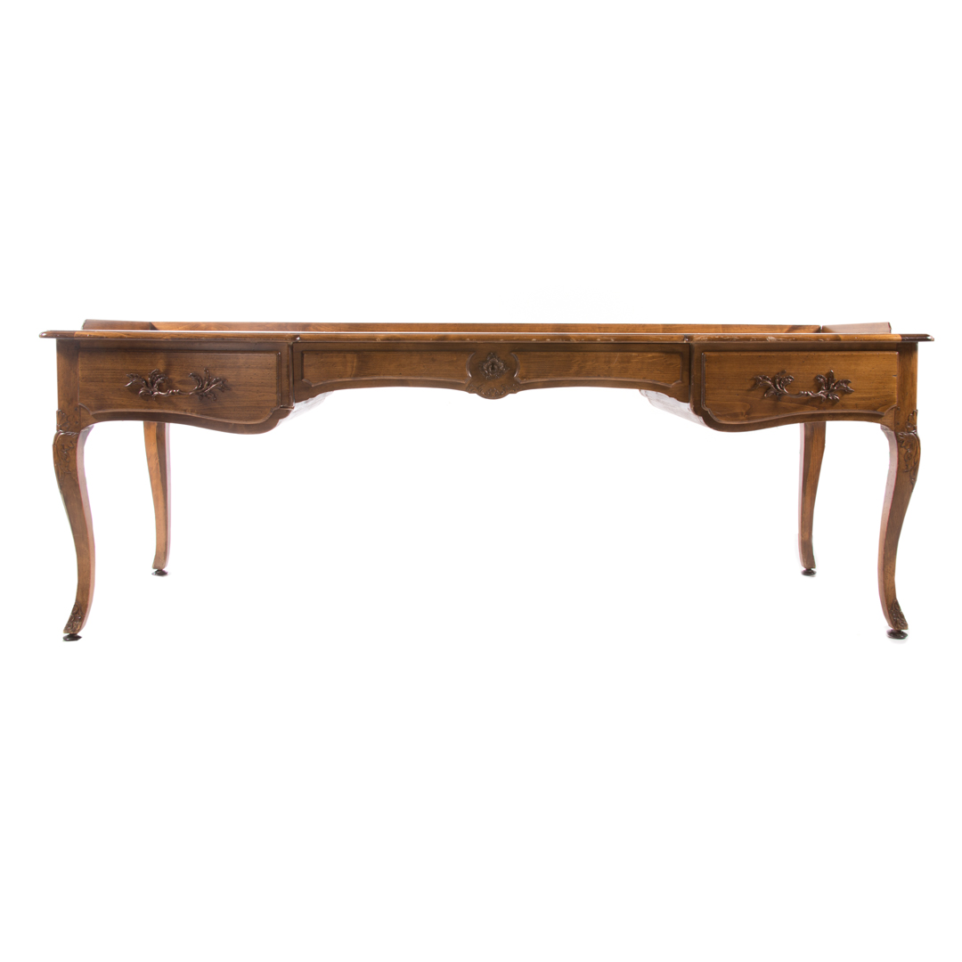 Appraisal: Louis XV style carved walnut bureau plat th century gilt