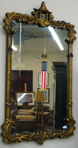 Appraisal: Asian motif decorator wall mirror with gold finish frame h