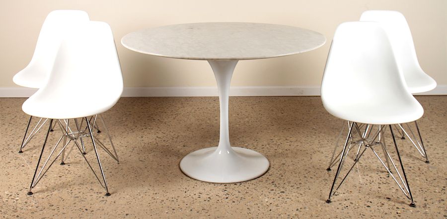 Appraisal: EERO SAARINEN STYLE TABLE AND FOUR CHAIRS A marble top