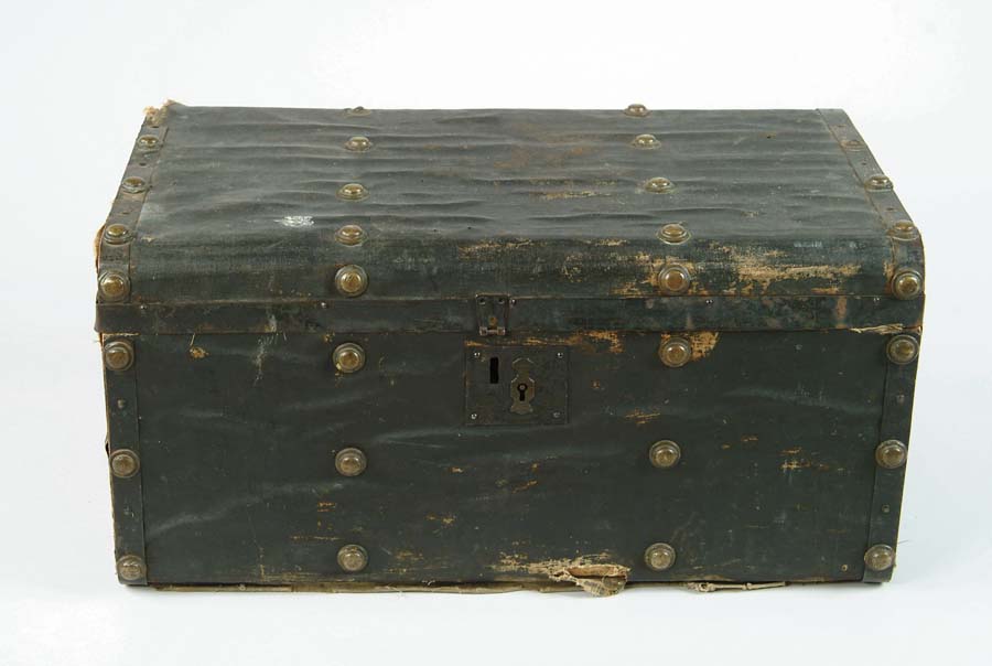 Appraisal: SMALL FLAT TOP TRAVELING TRUNK Black oilcloth trunk with strap