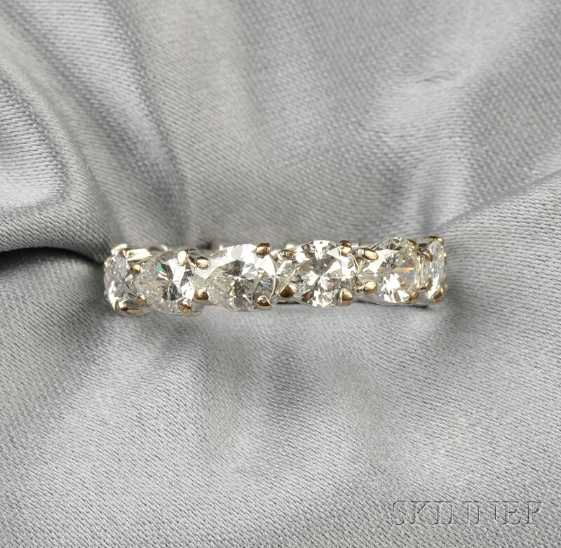 Appraisal: Platinum and Diamond Band set with twelve pear-shaped diamonds approx