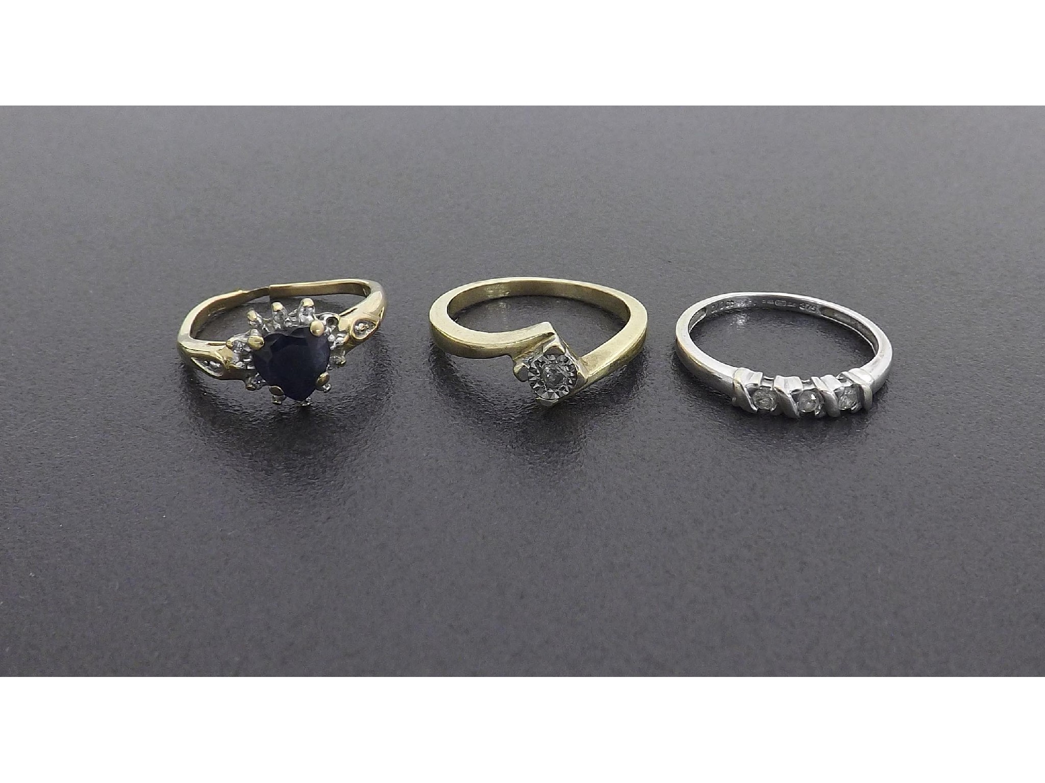 Appraisal: Three assorted ct gold diamond set rings including a heart