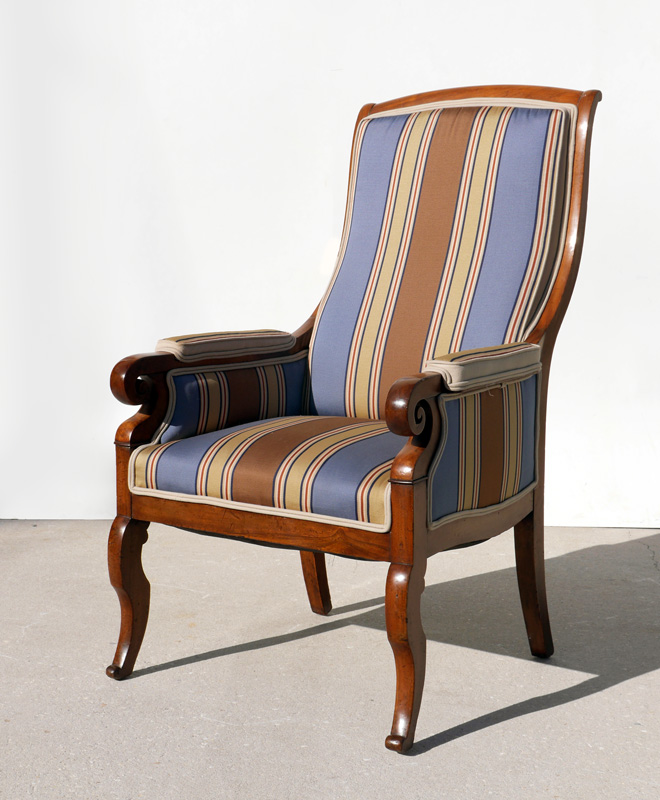 Appraisal: GENTLEMANS OVERSIZED MAHOGANY ARM CHAIR Mahogany frame with shaped back