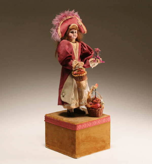 Appraisal: French automaton flower seller costumed in French Revolution era attire