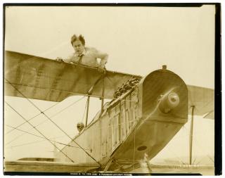 Appraisal: Houdini Harry Houdini Holding on to Airplane Wing in The