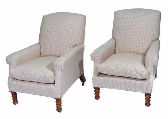 Appraisal: A PAIR OF VICTORIAN ARMCHAIRS standing on oak barley twist