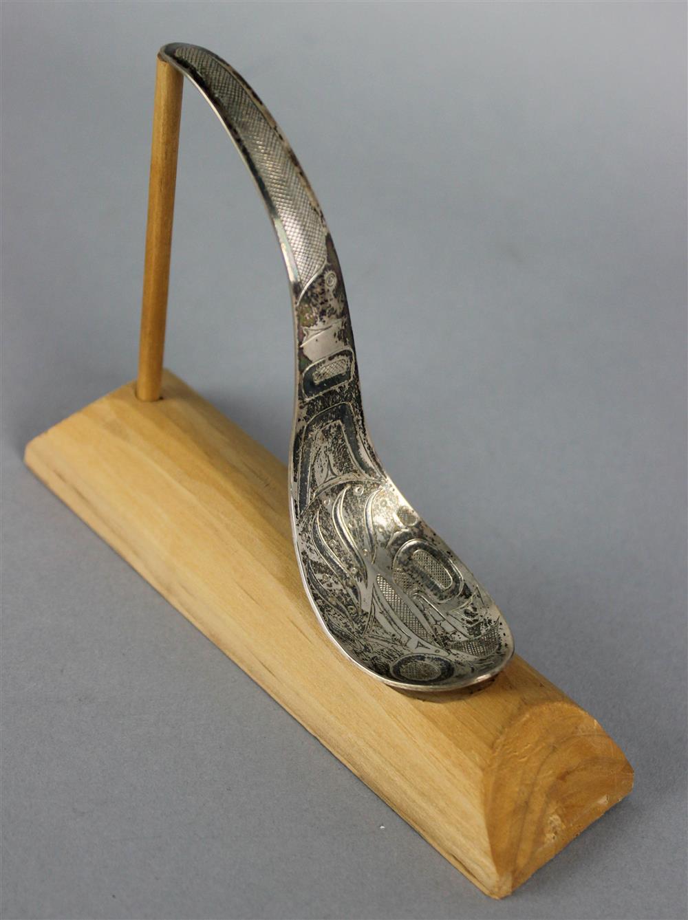 Appraisal: NORTHWEST COAST ENGRAVED SILVER SPOON circa late th Century finely