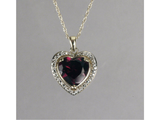 Appraisal: Pleasant ladies karat yellow gold heart design garnet and diamond