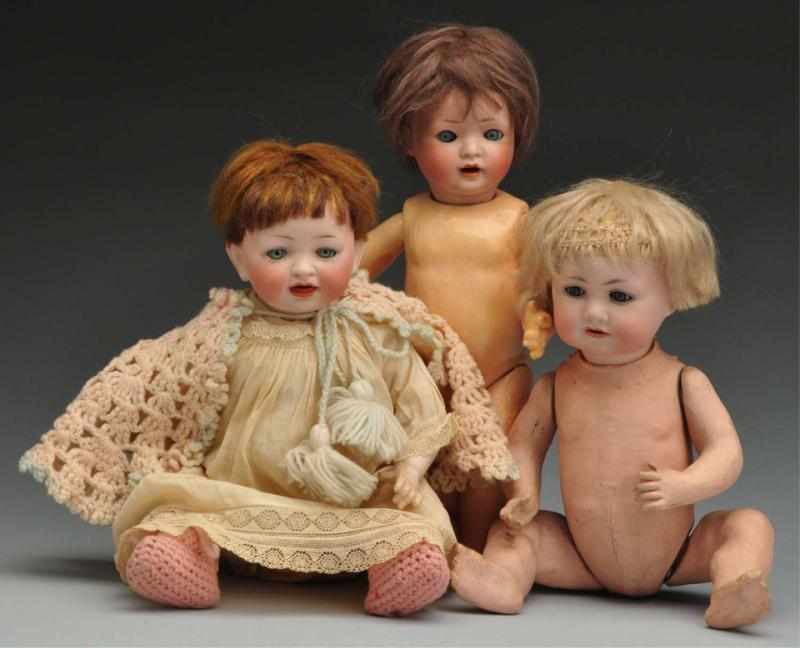 Appraisal: Lot of Character Baby Dolls Description with German bisque socket