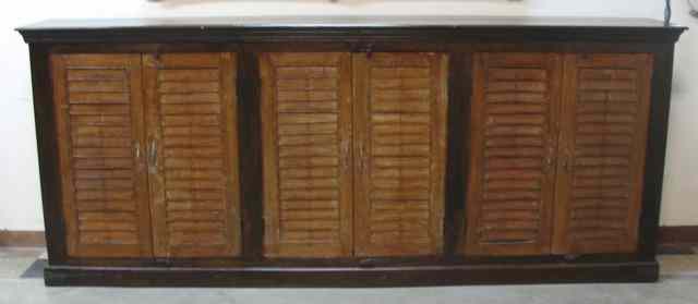 Appraisal: PLANTATION MAHOGANY CUPBOARD having three pairs of false louver doors