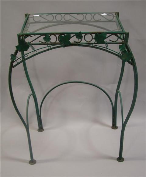 Appraisal: WROUGHT IRON AND GLASS TOP SIDE TABLE the rectangular glass