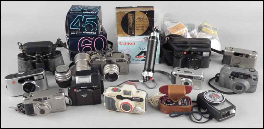 Appraisal: COLLECTION OF CAMERAS AND PHOTOGRAPHY EQUIPMENT With cameras lenses and