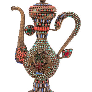 Appraisal: A Middle Eastern Coral Turquoise and Gemstone-Set Copper Ewer th