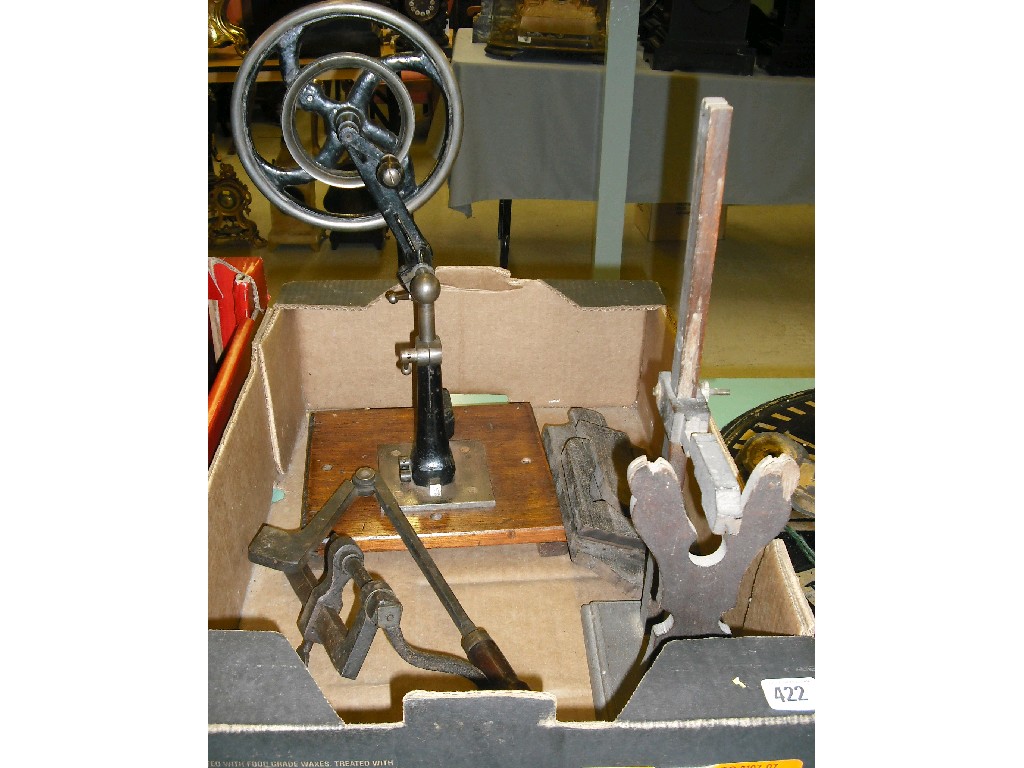 Appraisal: Clockmaker's hand wheel upon a square wooden base high cutting