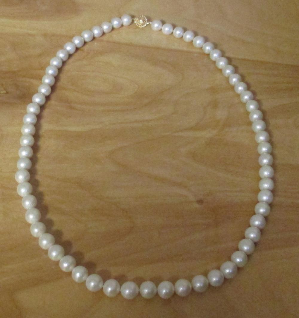 Appraisal: OPERA LENGTH PEARL AND FOURTEEN KARAT GOLD NECKLACE The -