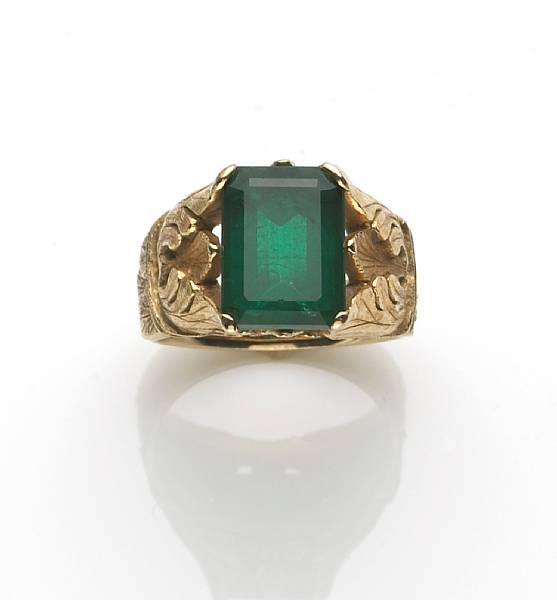 Appraisal: A synthetic emerald and k gold ring