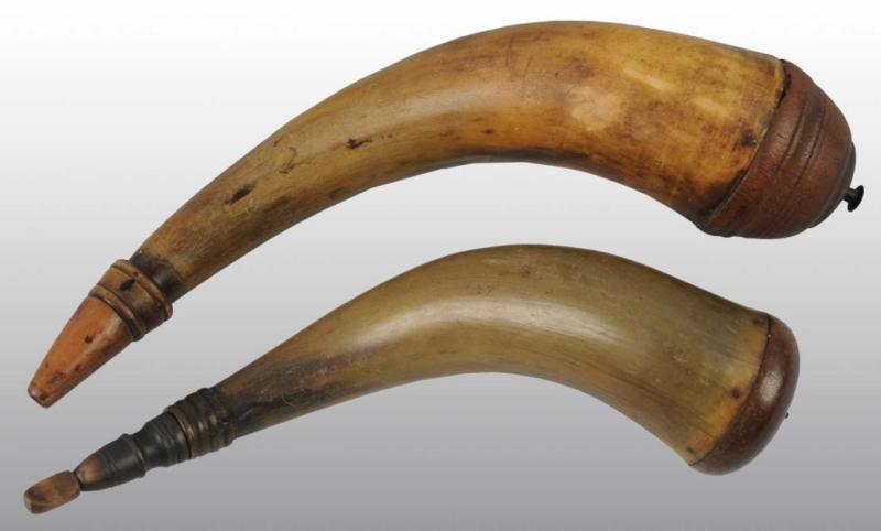 Appraisal: Lot of Screw-Tip Powder Horns Description Both have replaced tips