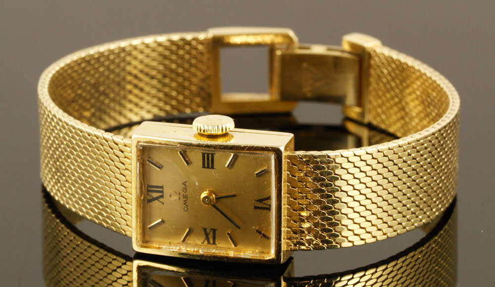 Appraisal: - K Omega Wristwatch K gold Omega wristwatch l approximately