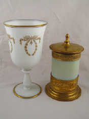 Appraisal: A large milk glass chalice with gilt swags ht cm