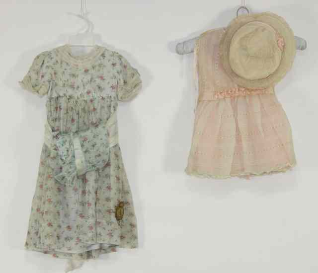 Appraisal: A child's chiffon dress circa s s multicoloured flowers on