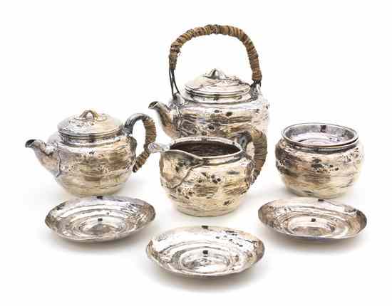 Appraisal: A Japanese Sterling Silver Eight-Piece Tea Service comprising a teapot