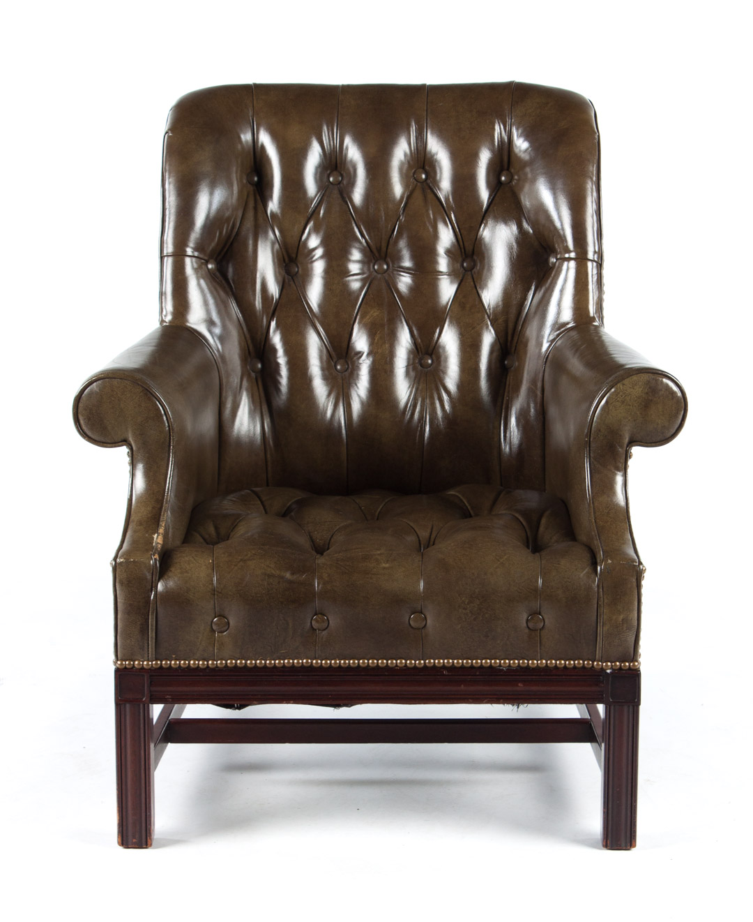 Appraisal: Chippendale style leather upholstered wing chair mahogany frame with straight