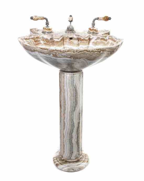 Appraisal: A Contemporary Onyx Pedestal Sink Sherle Wagner having a shell