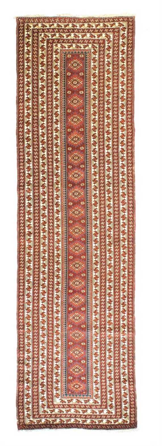 Appraisal: GENDJE RUNNER antique Narrow rust coloured central field with star