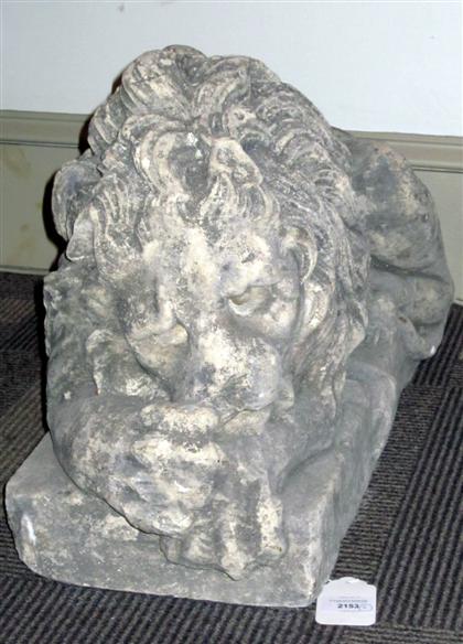 Appraisal: Pair of composition stone garden figures of lionsEach modeled as