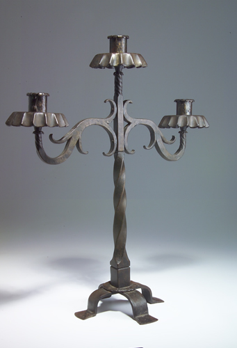 Appraisal: SAMUEL YELLIN STUDIO Large wrought-iron triple candelabrum with scalloped skirts