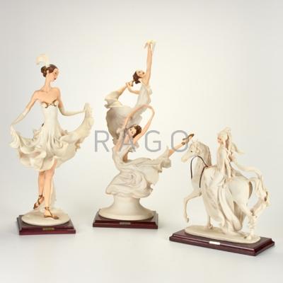 Appraisal: GIUSEPPE ARMANI Three porcelain figurines Ballerinas woman riding a horse