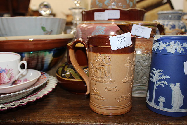 Appraisal: A BLUE AND WHITE TRANSFER PRINTED PINT TANKARD decorated with