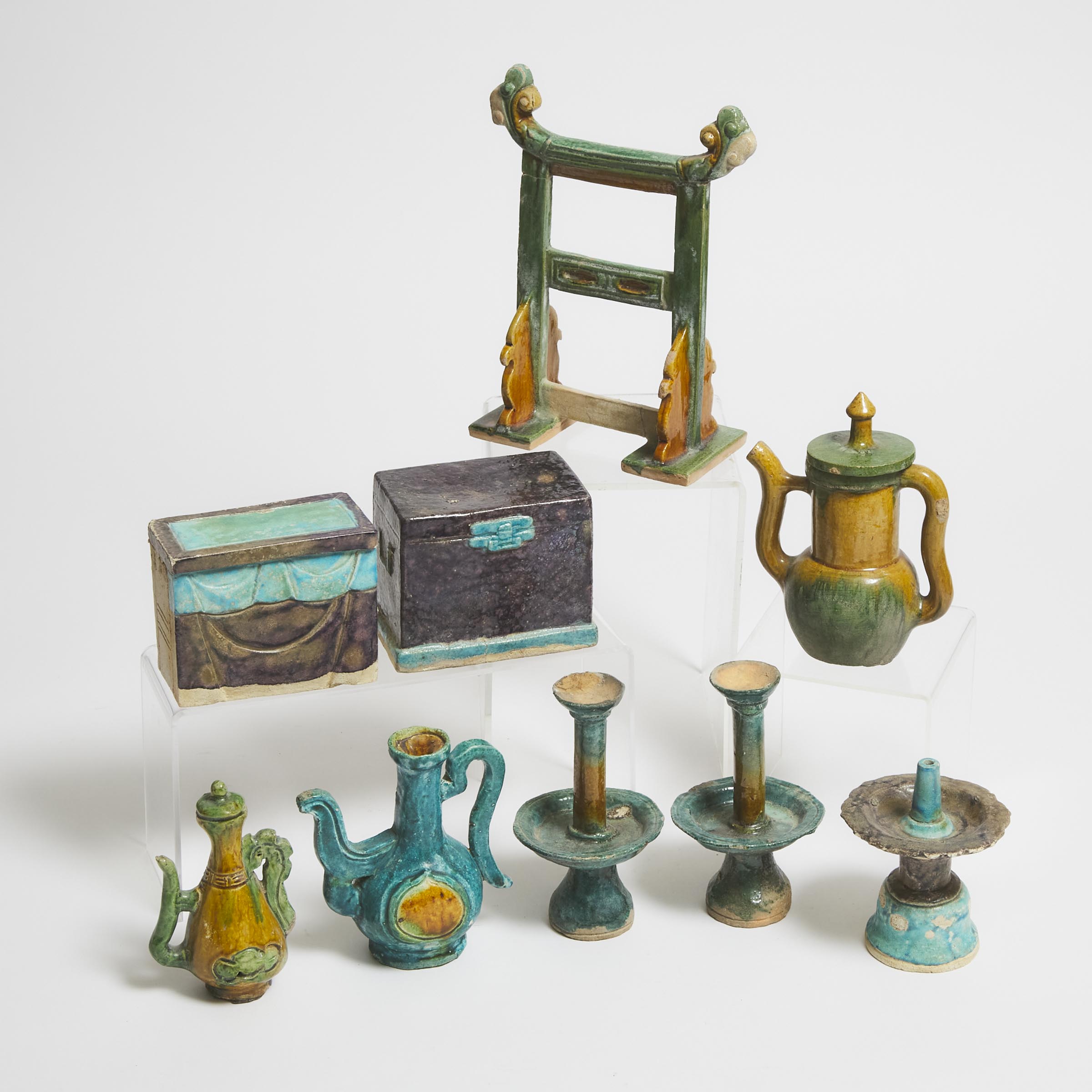 Appraisal: A Group of Nine Sancai and Fahua-Glazed Pottery Household Items