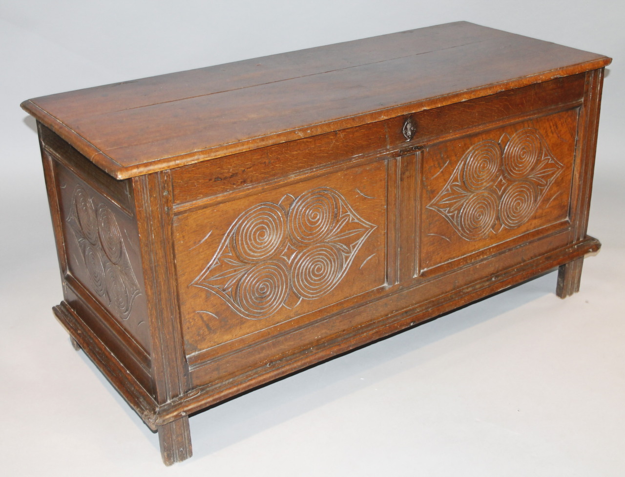 Appraisal: A principally thC oak coffer the rectangular overhanging top hinging