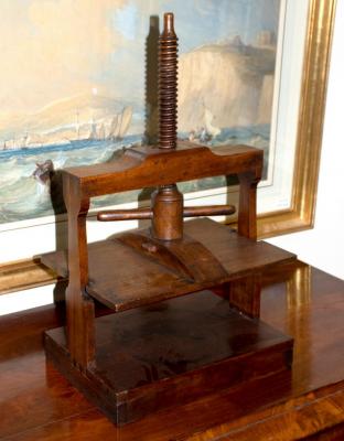 Appraisal: A mid th Century mahogany napkin press with turned screw