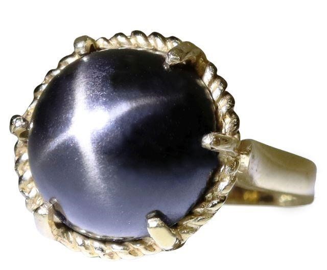 Appraisal: Estate kt yellow gold ring with black star diopside cabochon