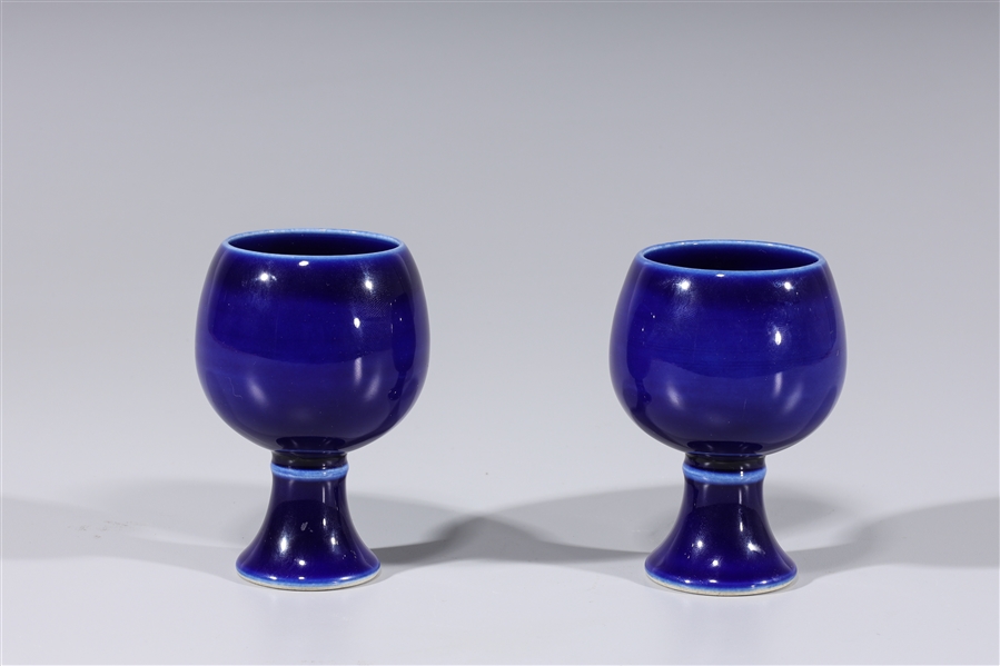 Appraisal: Pair of Chinese blue monochrome each with six-character mark to