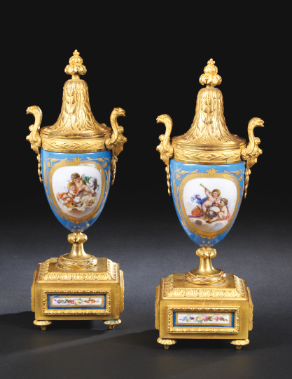 Appraisal: Pair of French Ormolu-Mounted Bleu Celeste Porcelain Covered Two-Handled Garniture