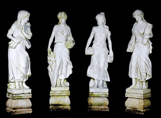 Appraisal: Continental school FIGURES OF FOUR SEASONS carved marble mounted on