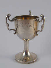 Appraisal: Nauticalia A silver miniature loving cup engraved RMS Durham Castle