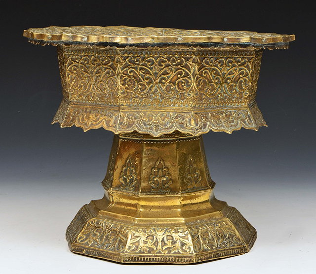 Appraisal: A MALAY LARGE BRASS PEDESTAL BOWL and stand of octagonal