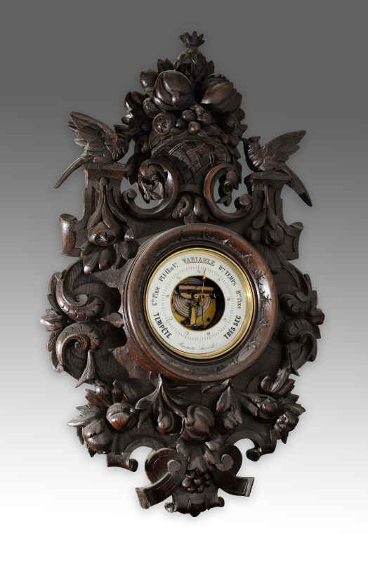 Appraisal: BLACK FOREST PROFUSELY CARVED WALL BAROMETER Frame covered in carved