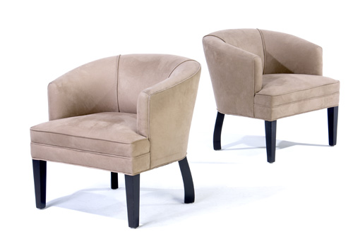 Appraisal: BILLY HAINES Pair of barrel chairs on ebonized frames upholstered