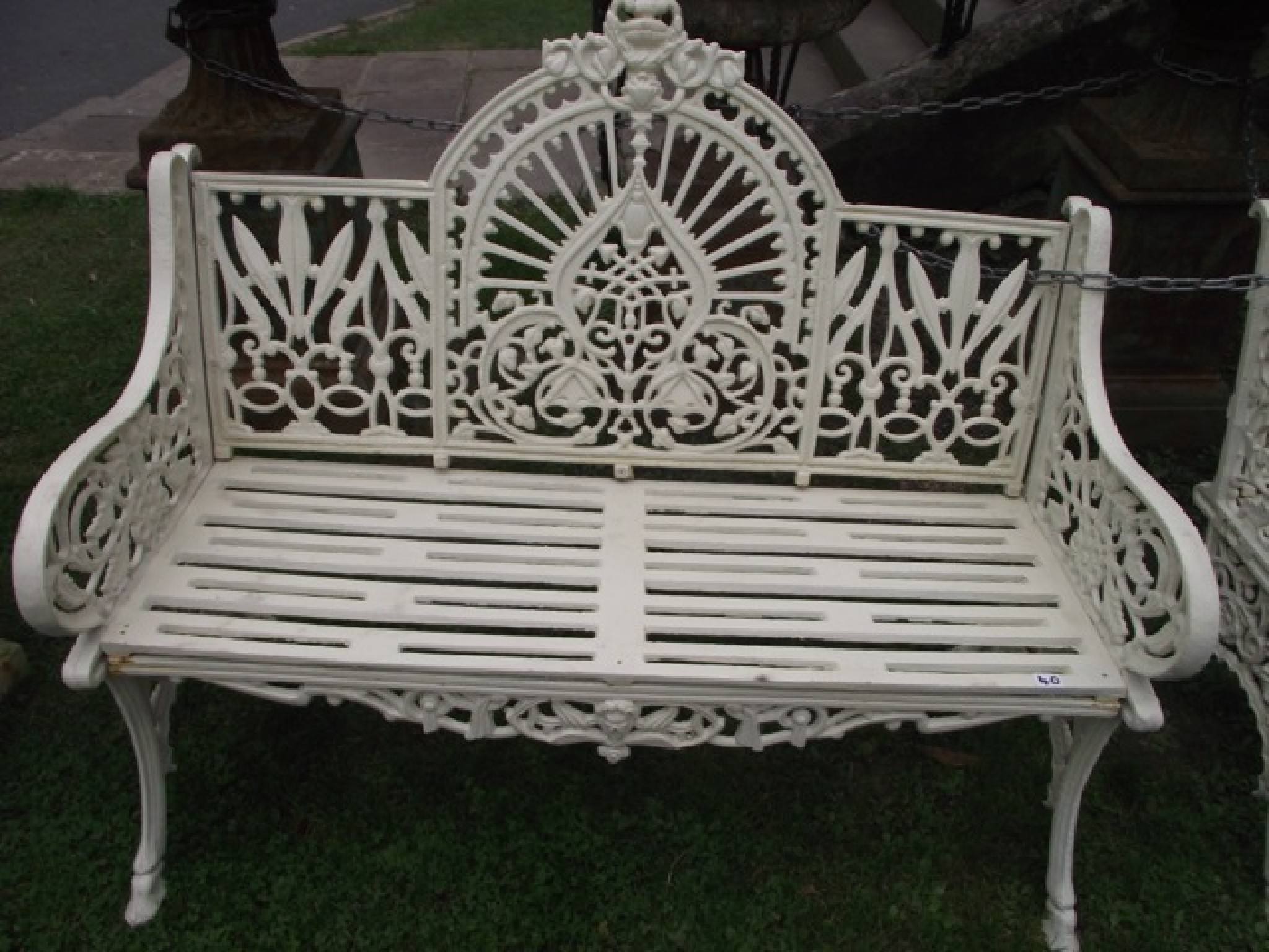 Appraisal: A good quality reproduction heavy cast iron two seat garden