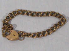 Appraisal: A carat gold bracelet with hallmarked carat gold heart padlock