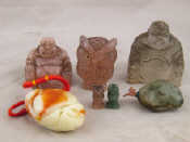 Appraisal: Seven hardstone carvings including representations of Buddha and owls